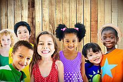 photo of seven smiling children