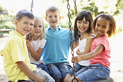 photo of five children on a playground