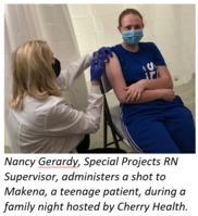 teen getting COVID-19 vaccine at Cherry Health