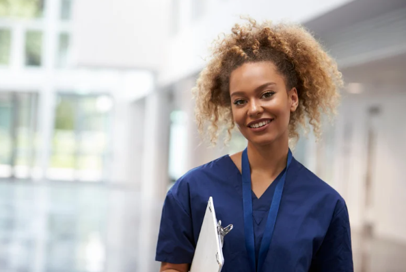 A nurse wearing navy scrubs