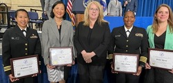 Award winners LCDR Stephanie Lim, Sue Lin, CDR Julia Bryan, Fraser Byrne, and Lindsey Nienstedt with Administrator Johnson