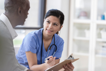 Female Nurse with Patient