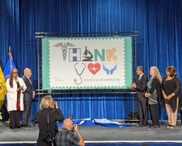 HRSA Joins in Ceremony for New Postal Stamp Honoring Health Care Community 