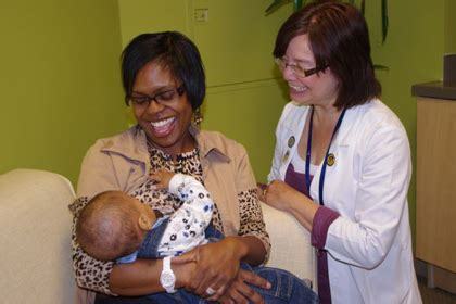 A mother and child receive professional support