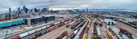 image of city railway tracks and warehouses