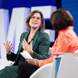 photo of Claire Shipman speaking at IMF Inspired event