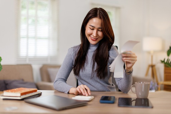 Tax deduction planning concept. Business asian woman calculating business balance prepare tax reduction.