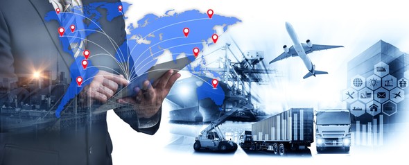 Businessman with tablet, map of world, container ship, truck, plane