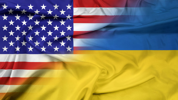 Waving Ukraine and US Flags