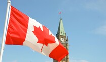 Canadian Flag in front of Tower