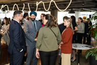 SelectUSA Executive Director Jasjit Singh speaks with people at an event in Washington DC