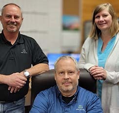Apis Tactical team - 3 individuals standing together