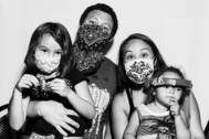 A family wearing masks during the Covid-19 pandemic