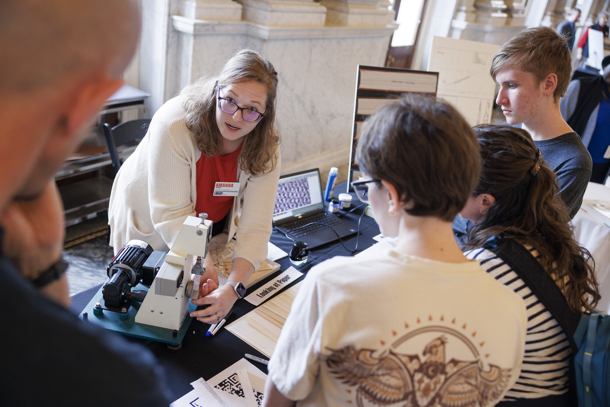 Show and tell: Preservation Research and Testing Division staff share information tables and interactive science experiments with visitors during Discovery Night at the Library of Congress.