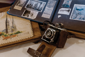 A open scrapbook features a soldier's World War II photos 