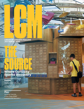 A young visitor checks out the towering card catalog in The Source. Photo by Shawn Miller