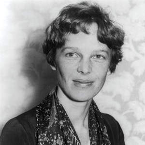 Amelia Earhart smiles for the camera in a head and shoulders portrait. Prints and Photographs Division