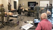 instructor teaching life support 