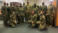 doctors pose in masks