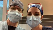 Capt. Jennifer McGuigan and a coworker