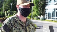 Navy officer Mark Fisher wearing face mask