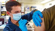 person getting vaccinated