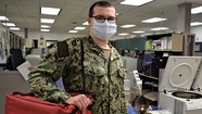 navy person in mask