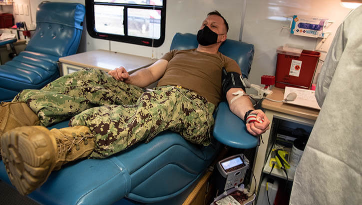 Sailor donating blood