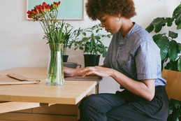 woman works on laptop