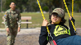 Rocio Romo playing with son