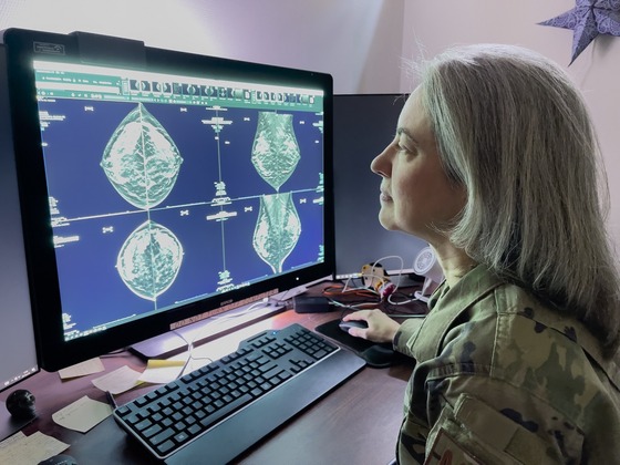Lt. Col. Teresa Finnila reviews mammogram images as part of routine screening.