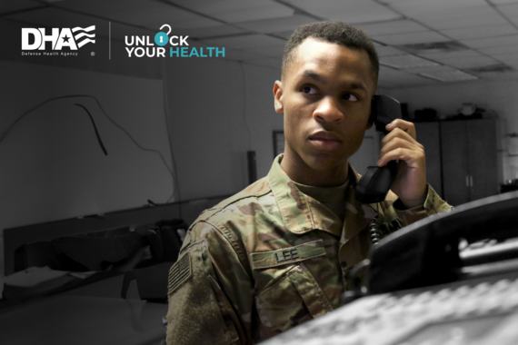 Uniformed service member answers landline phone in a medical office