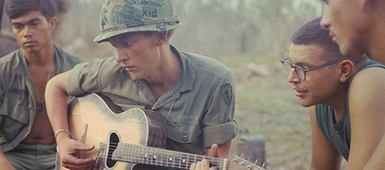 soldiers with guitar