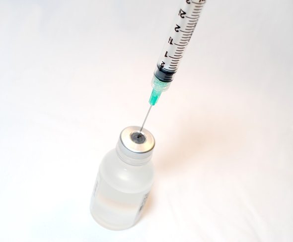 vaccine and syringe