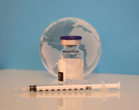 Syringe, vaccine bottle, and glass globe
