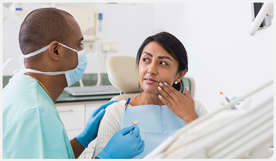 Dentist with patient