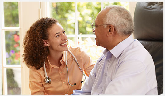 Health care professional working with patient