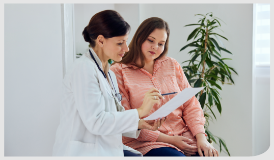 A doctor and patient talking. 