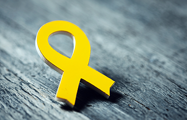 A yellow endometriosis awareness ribbon.