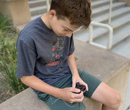 Study participant reviews information on his artificial pancreas device