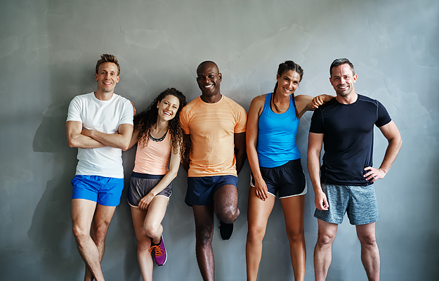 A small group of people wearing activewear.