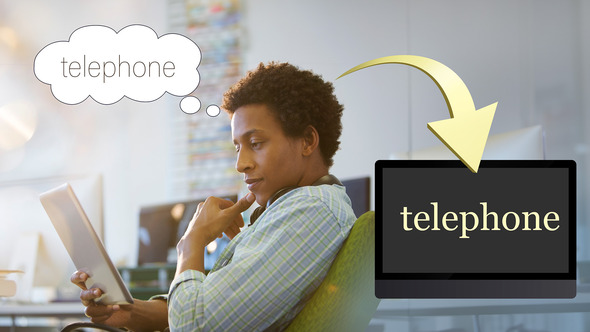 A man sitting and reading. He is thinking about the word "telephone" and it's appearing on a screen