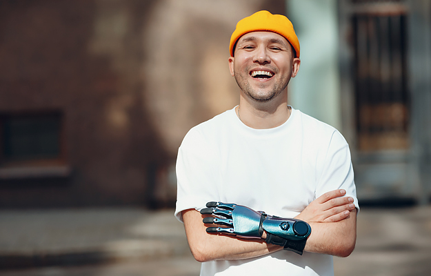 A young man with a prosthetic hand.