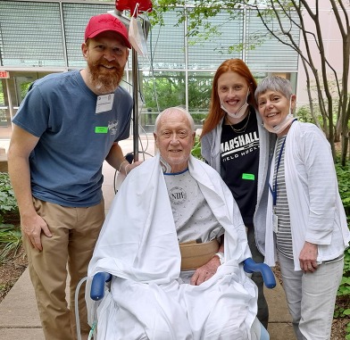Marcy Mager and family in the Clinical Center’s healing gardens. 