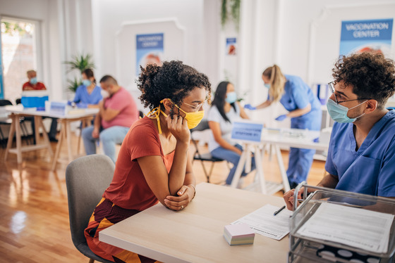 health care provider talking with woman