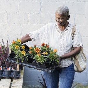 Woman outdoors with plants