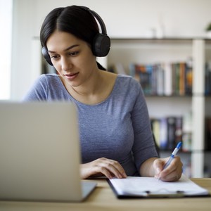 Young woman working from home