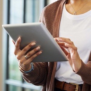 Woman holding ipad