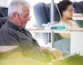 Man receiving IV cancer medicine