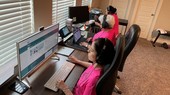 Three women work the Texas COVID-19 hotline.